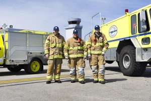 Firefighters with trucks