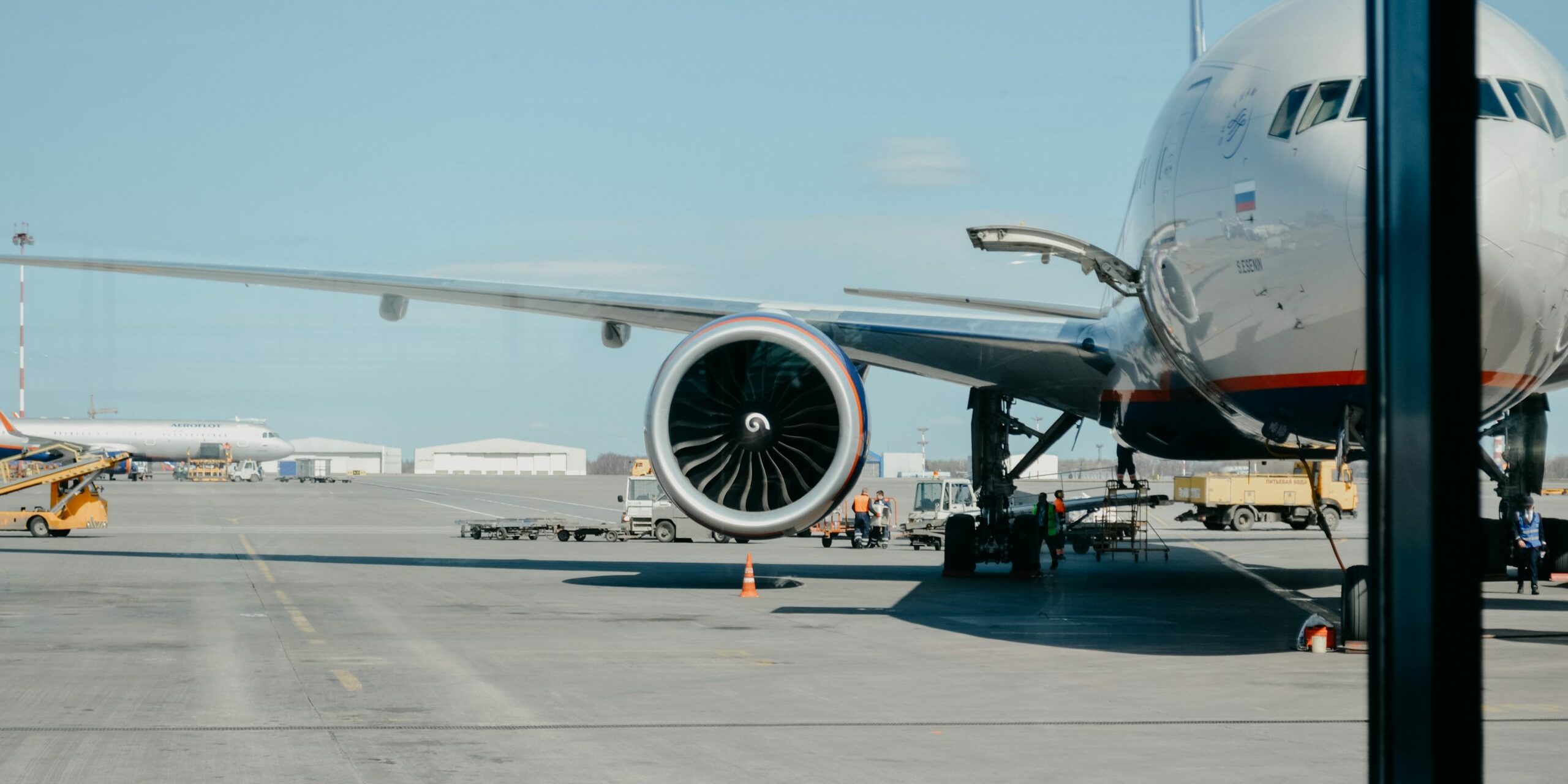 Plane on airport tarmac out window